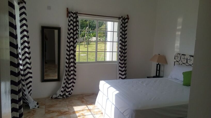 Imagen de la habitación del Hotel Villa Juanita, Happy Grove. Foto 19