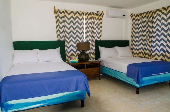 Imagen de la habitación del Hotel Villa Juanita, Happy Grove. Foto 20