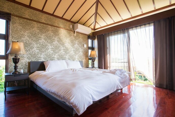 Imagen de la habitación del Hotel Villa Kailani. Foto 8