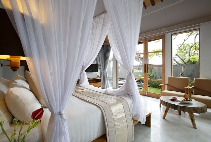 Imagen de la habitación del Hotel Villa Kayu Lama. Foto 10