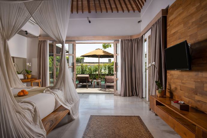 Imagen de la habitación del Hotel Villa Kayu Lama. Foto 12