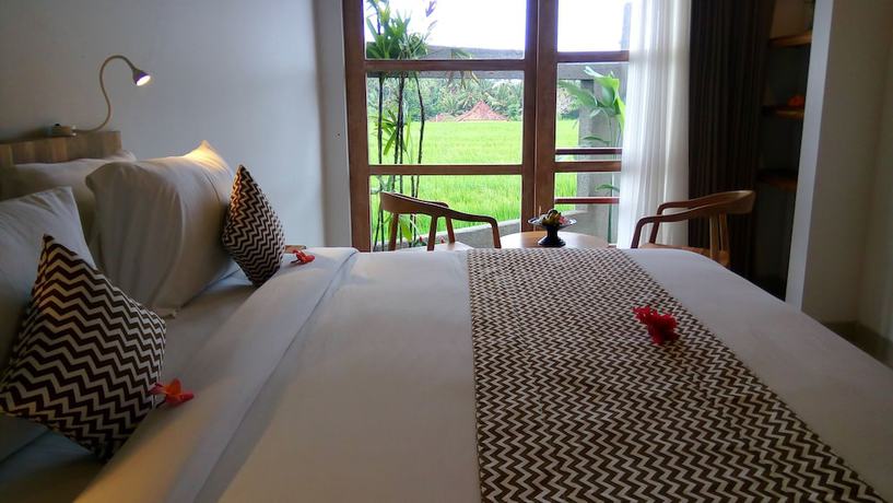 Imagen de la habitación del Hotel Villa Kayu Lama. Foto 13