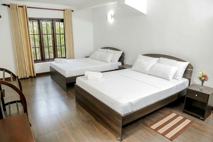 Imagen de la habitación del Hotel Villa Kengalle. Foto 11