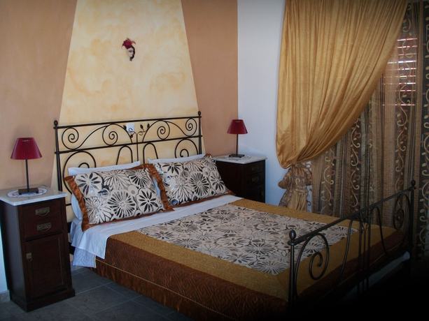 Imagen de la habitación del Hotel Villa Koronios. Foto 11