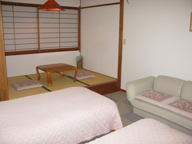Imagen de la habitación del Hotel Villa Kubota. Foto 27