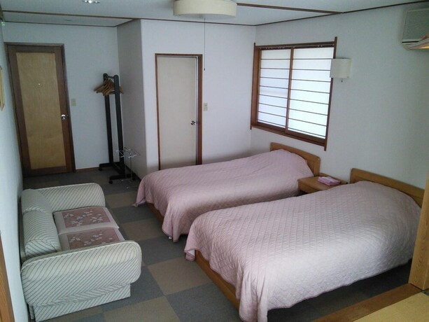 Imagen de la habitación del Hotel Villa Kubota. Foto 28