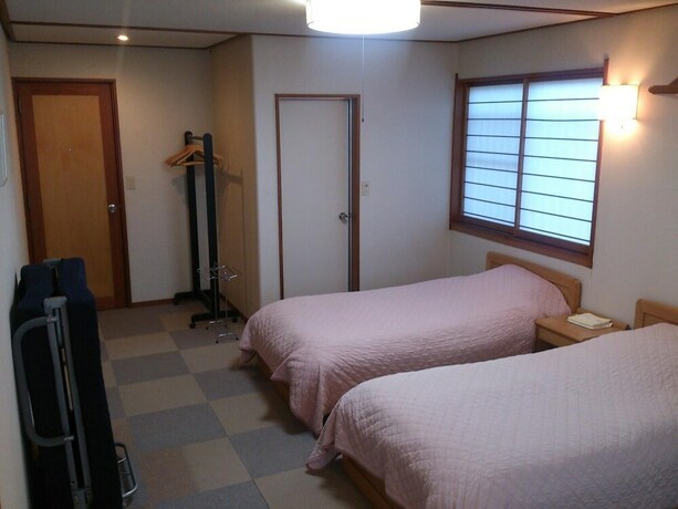 Imagen de la habitación del Hotel Villa Kubota. Foto 30
