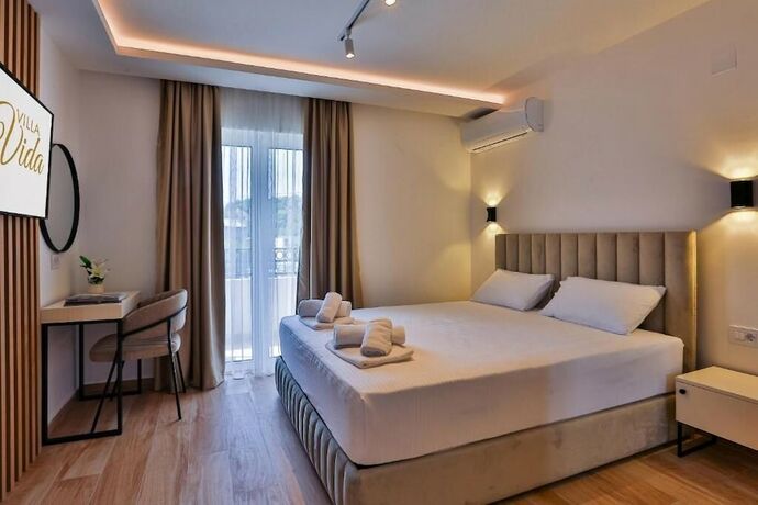 Imagen de la habitación del Hotel Villa La Vida. Foto 17
