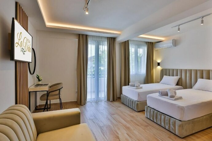 Imagen de la habitación del Hotel Villa La Vida. Foto 19