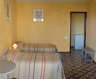 Imagen de la habitación del Hotel Villa Las Flores. Foto 9