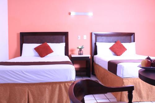 Imagen de la habitación del Hotel Villa Las Rosas. Foto 6