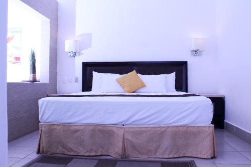 Imagen de la habitación del Hotel Villa Las Rosas. Foto 8