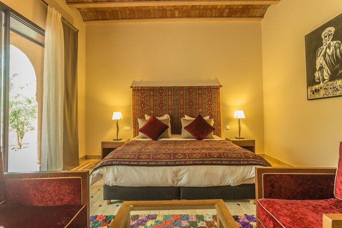 Imagen de la habitación del Hotel Villa Le Perroquet Bleu. Foto 13