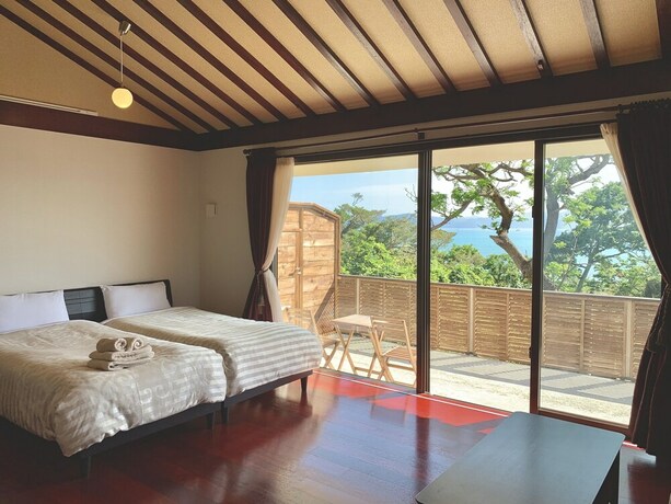 Imagen de la habitación del Hotel Villa Leilani. Foto 8