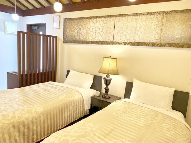 Imagen de la habitación del Hotel Villa Leilani. Foto 11