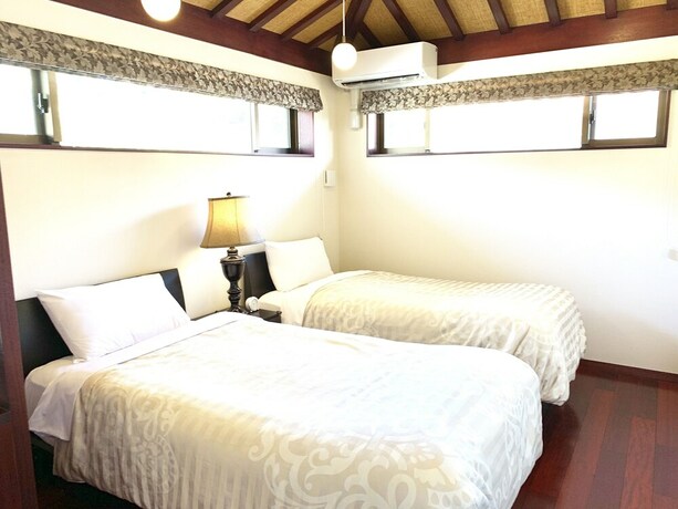 Imagen de la habitación del Hotel Villa Leilani. Foto 12