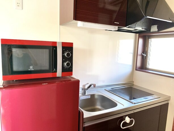 Imagen de la habitación del Hotel Villa Leilani. Foto 14