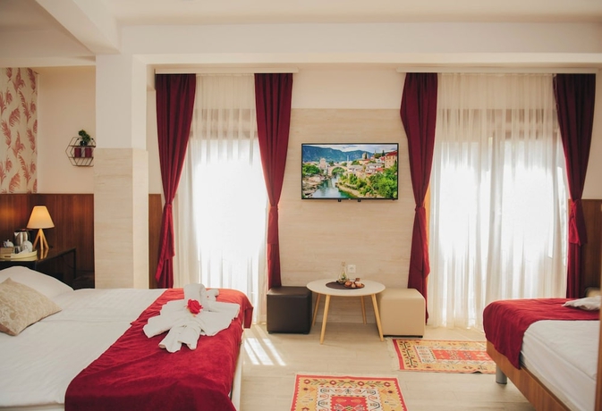 Imagen de la habitación del Hotel Villa Lejla. Foto 7