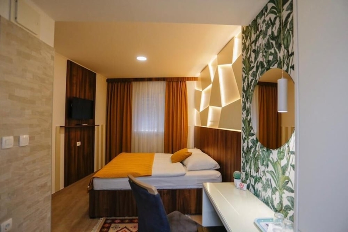 Imagen de la habitación del Hotel Villa Lejla. Foto 11