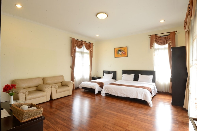 Imagen de la habitación del Hotel Villa Lemon. Foto 13