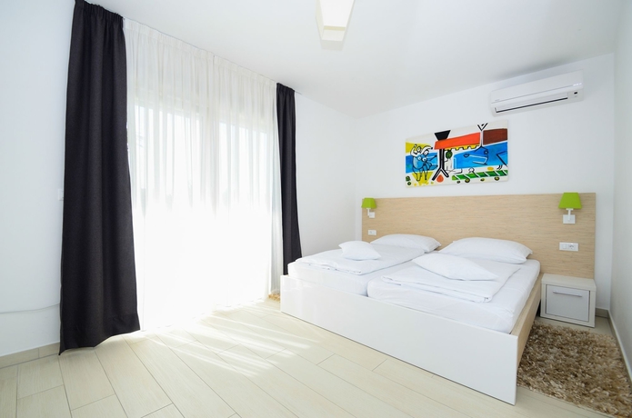 Imagen de la habitación del Hotel Villa Liburnum. Foto 11