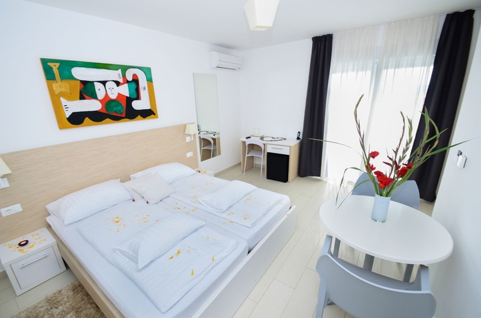 Imagen de la habitación del Hotel Villa Liburnum. Foto 16