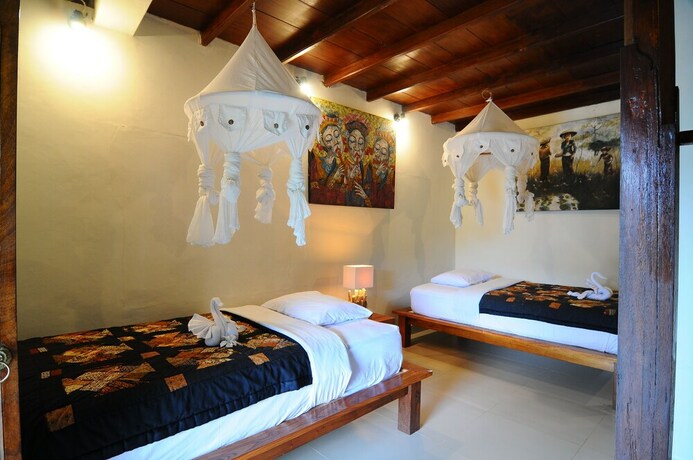 Imagen de la habitación del Hotel Villa Lihat Sawah. Foto 33