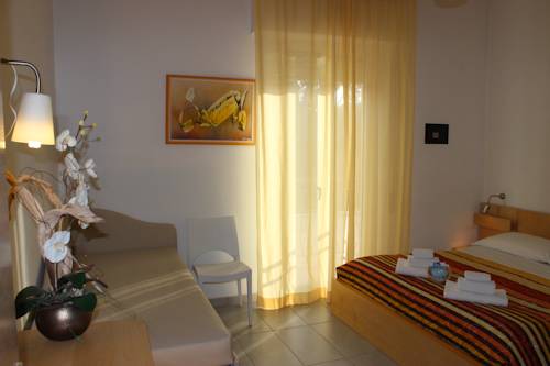Imagen de la habitación del Hotel Villa Liliana. Foto 7