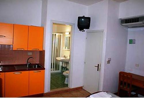 Imagen de la habitación del Hotel Villa Liliana. Foto 12