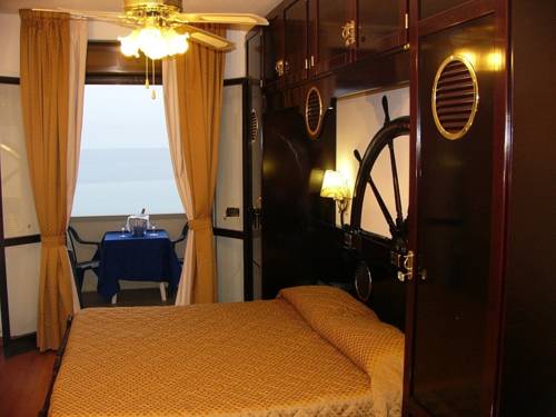 Imagen de la habitación del Hotel Villa Lo Scoglietto. Foto 11