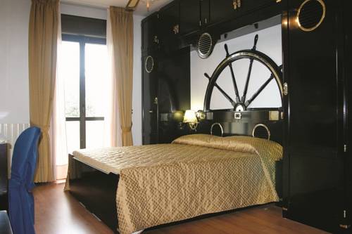 Imagen de la habitación del Hotel Villa Lo Scoglietto. Foto 12