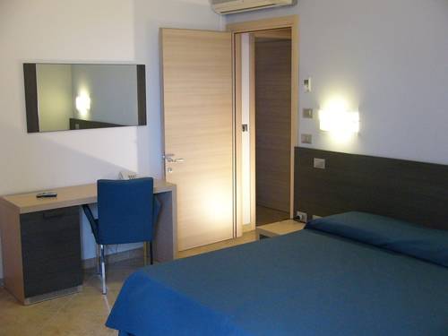 Imagen de la habitación del Hotel Villa Lo Scoglietto. Foto 13