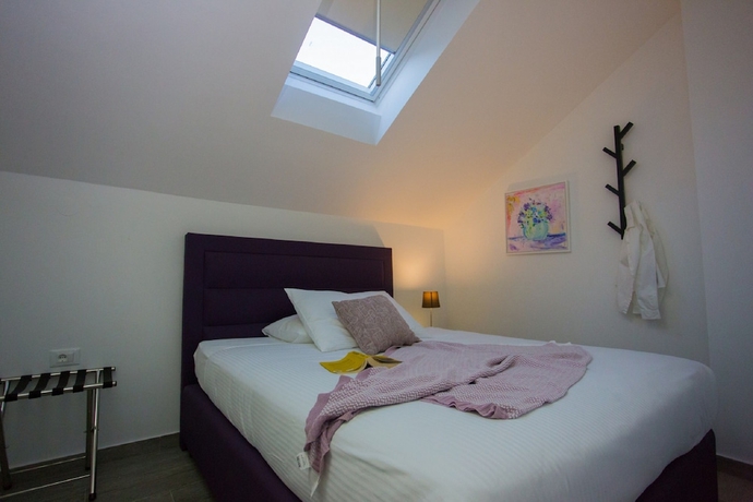 Imagen de la habitación del Hotel Villa Luka's. Foto 15