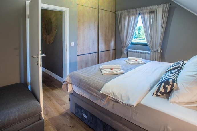 Imagen de la habitación del Hotel Villa Lusso. Foto 6