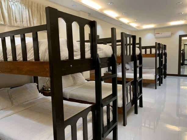 Imagen de la habitación del Hotel Villa MJ Maristela Beach Resort. Foto 18