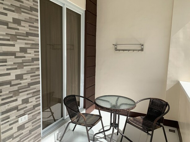 Imagen de la habitación del Hotel Villa MJ Maristela Beach Resort. Foto 19