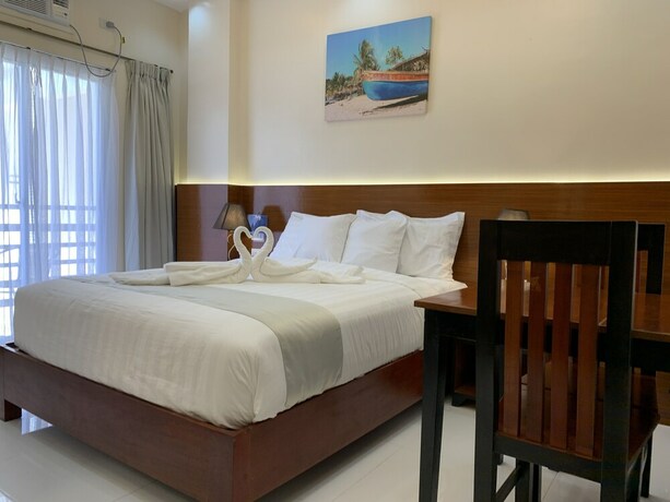 Imagen de la habitación del Hotel Villa MJ Maristela Beach Resort. Foto 21