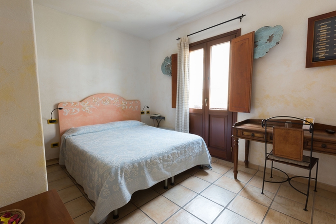 Imagen de la habitación del Hotel Villa Madau. Foto 4