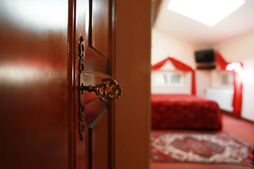 Imagen de la habitación del Hotel Villa Madruzzo. Foto 11