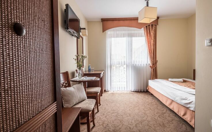 Imagen de la habitación del Hotel Villa Magnat. Foto 14