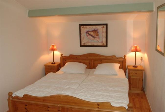 Imagen de la habitación del Hotel Villa Magnolia. Foto 4