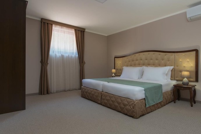 Imagen de la habitación del Hotel Villa Magus. Foto 9