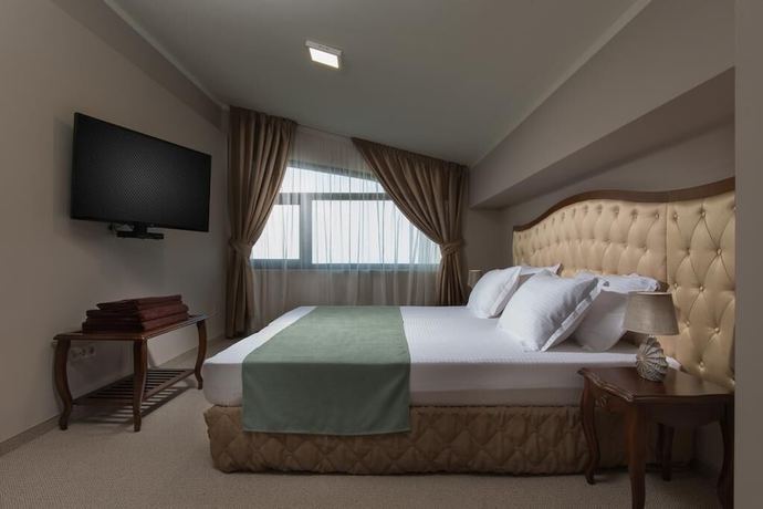 Imagen de la habitación del Hotel Villa Magus. Foto 12