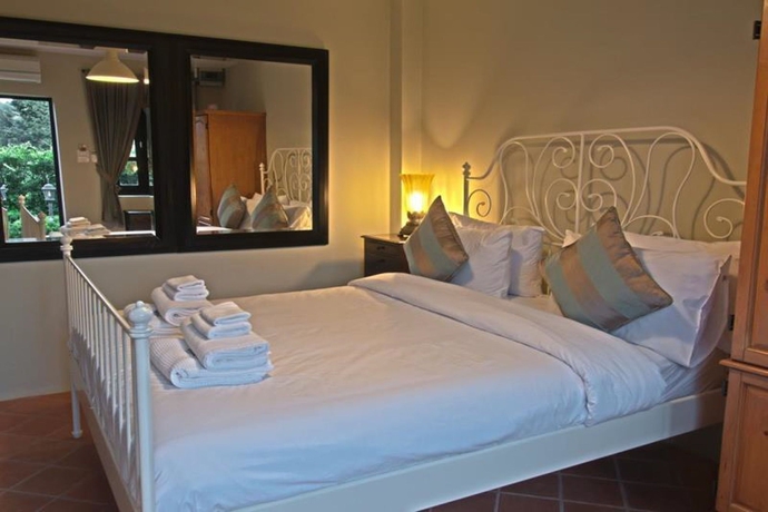 Imagen de la habitación del Hotel Villa Malinee Khao Yai. Foto 10