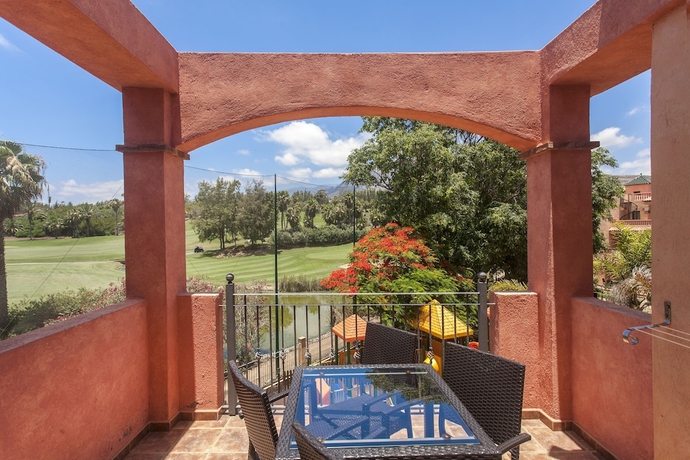 Imagen de la habitación del Hotel Villa Mandi Golf Resort. Foto 12