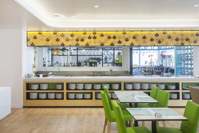 Imagen del bar/restaurante del Hotel Villa Mandi Golf Resort. Foto 4