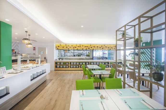 Imagen del bar/restaurante del Hotel Villa Mandi Golf Resort. Foto 5