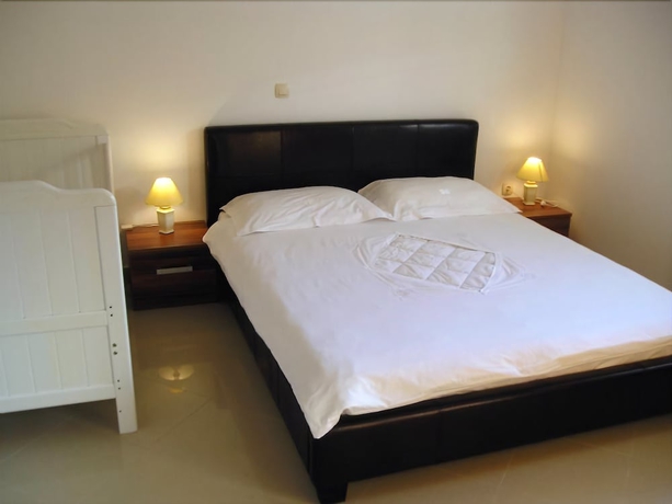 Imagen de la habitación del Hotel Villa Mandolina Apartments. Foto 7