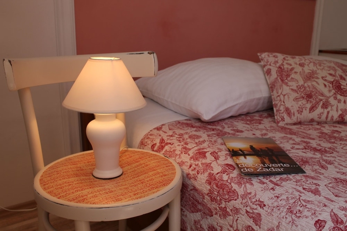 Imagen de la habitación del Hotel Villa Mandolina Apartments. Foto 8