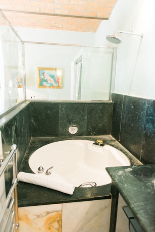 Imagen de la habitación del Hotel Villa Mangiacane - Small Luxury Hotels Of The World. Foto 11